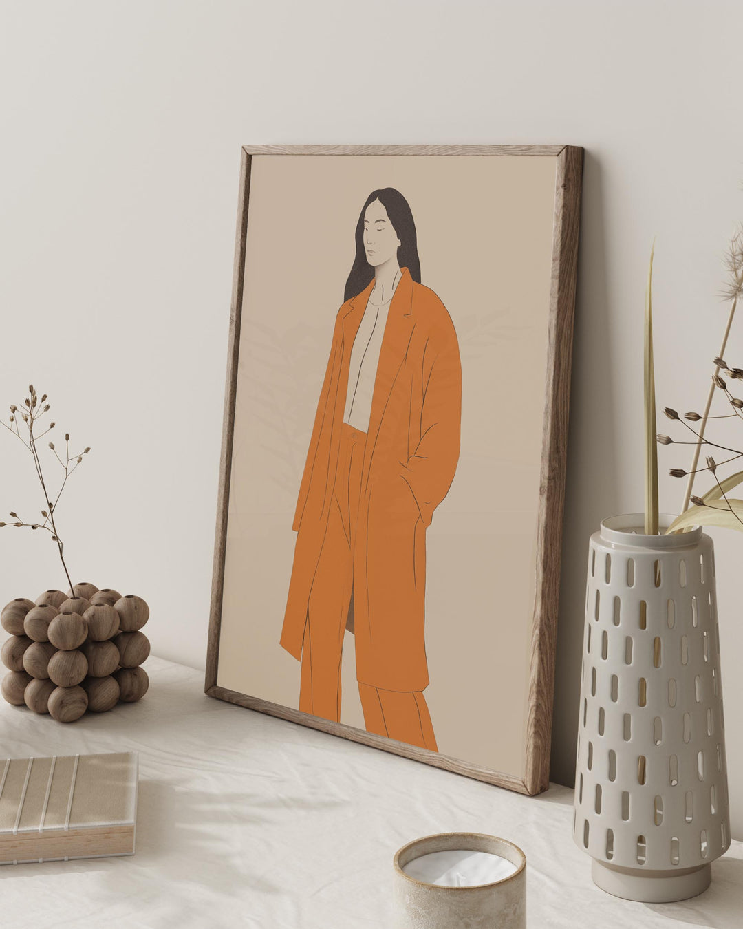large stylish poster figurative art female wall art in orange suit in danish scan beige aesthetic home with candle